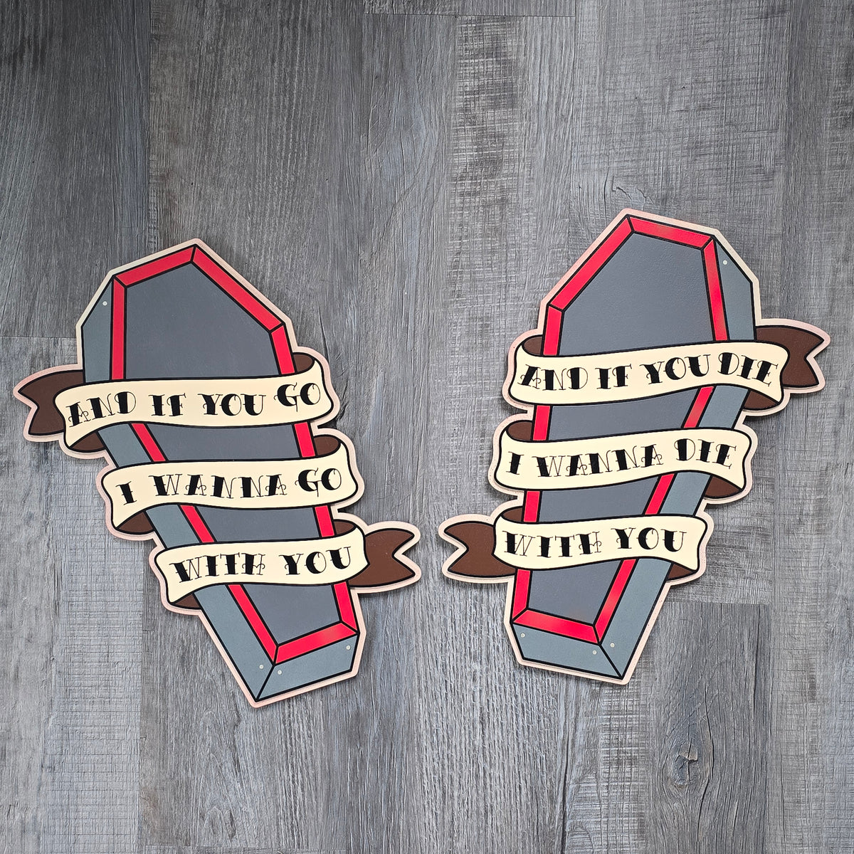 Pair of traditional tattoo style wooden coffin wall art pieces featuring banners reading "And if you go, I wanna go with you" and "And if you die, I wanna die with you."