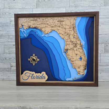 3D bathymetric map of Florida with wooden frame and 'Florida' label.
