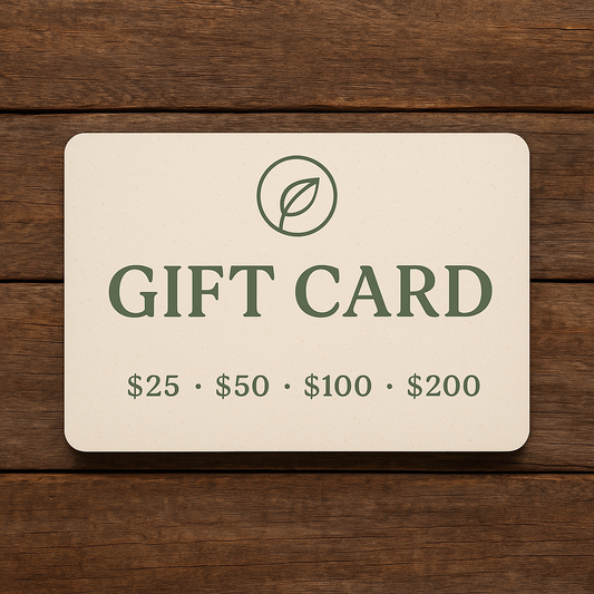 Gift card with a leaf logo on a wooden surface