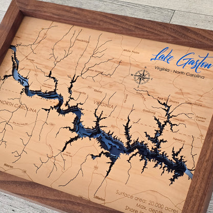 Wooden map of Lake Gaston with blue water detail on a wooden frame.