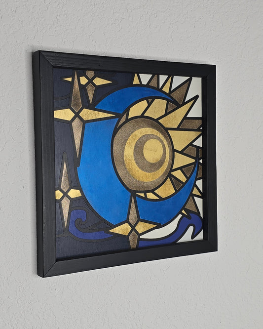 A square wood art piece titled Celestial Mini. The design depicts a vibrant blue crescent moon interlocking with a gold and yellow sunburst. Four-pointed metallic gold stars are scattered against a dark navy and charcoal background. The artwork is finished with a black wooden frame and features a geometric, stained-glass aesthetic.