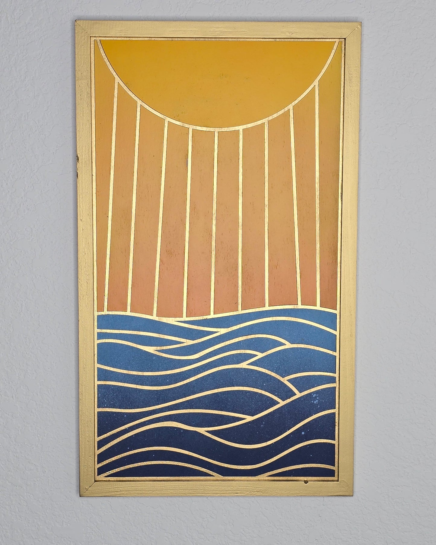 Decorative wall art with abstract patterns on a gray background