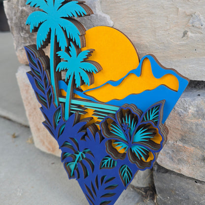 "Soundside Sunset" multi-layered tropical geometric wood art featuring a sunset silhouette, palm trees, and hibiscus details