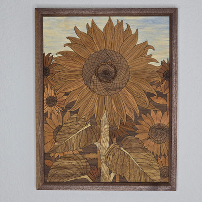 Framed artwork of sunflowers on a plain wall